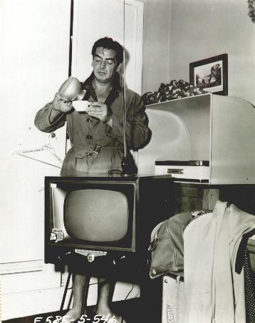Victor Mature with television